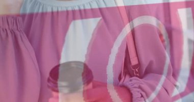 Animation of data processing over biracial businesswoman using smartphone in airport. Global business, finances, computing and data processing concept digitally generated video.