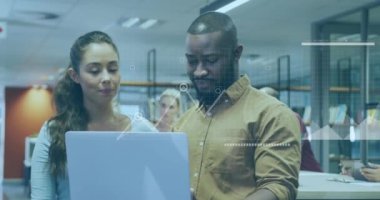 Animation of financial data processing over diverse business people working in office. Global business, finances, computing and data processing concept digitally generated video.