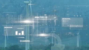 Animation of interface with data processing over windmill on grassland against blue sky. Computer interface and renewable energy technology concept