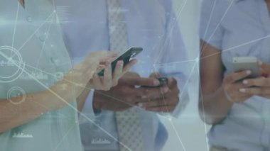 Animation of network of connections over mid section of businesspeople using smartphones. Global networking and business technology concept