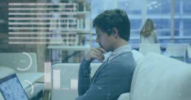 Animation of statistical data processing against thoughtful biracial man using laptop at office. Business data technology concept