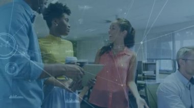 Animation of network of connections and data processing over diverse colleagues discussing at office. Global networking and business technology concept