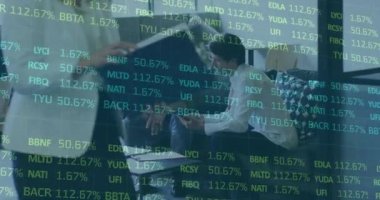 Animation of financial data processing over diverse business people. Global business, finances, computing and data processing concept digitally generated video.