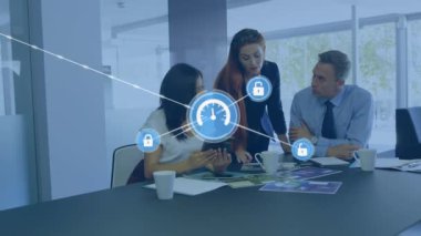 Animation of icons connected with lines over multiracial coworkers discussing reports in office. Digital composite, multiple exposure, business, communication, teamwork and technology concept.