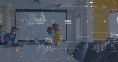 Animation of geometric shapes and connected lines over diverse coworkers sharing ideas in meeting. Digital composite, multiple exposure, business, teamwork, planning, technology and office.
