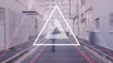 Animation of traingles over biracial woman using scooter on street. Lifestyle, abstract background and digital interface concept concept digitally generated video.