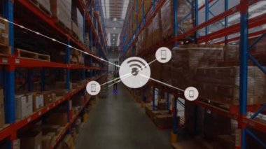 Animation of network of connections with icons over african american man working in warehouse. Global shipping, business, finances, computing and data processing concept digitally generated video.