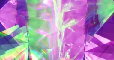 Animation of clear shiny prism moving over colourful light spots. Abstract background and pattern concept digitally generated video.