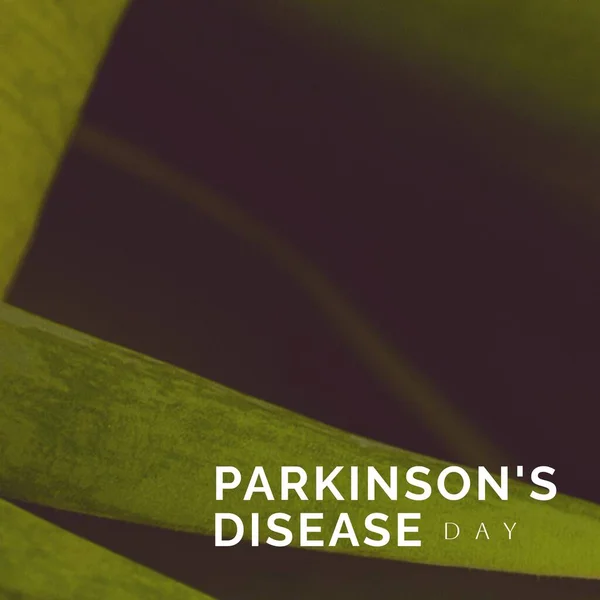 Composition of parkinson\'s disease day text and copy space on green background. Parkinson\'s disease day and health awareness concept digitally generated image.