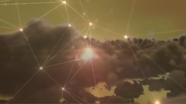 Animation of glowing network of connections against dark clouds in the sky. Global networking and business technology concept
