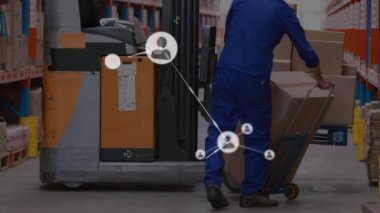 Animation of network of profiles over caucasian male worker loading boxes in forklift at warehouse. Global networking and transportation business concept