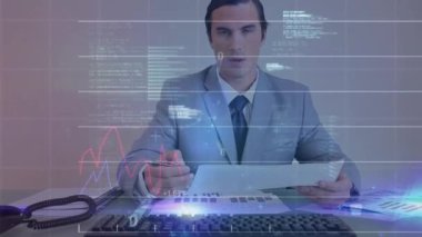 Animation of statistical data processing over caucasian businessman reading documents at office. Global economy and business technology concept