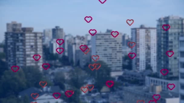 Animasi Dari Beberapa Ikon Jantung Merah Mengambang Terhadap Pandangan Udara — Stok Video
