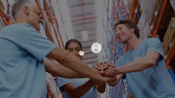 Animation Digital Icons Three Diverse Volunteers Stacking Hands Together Warehouse — Stockvideo