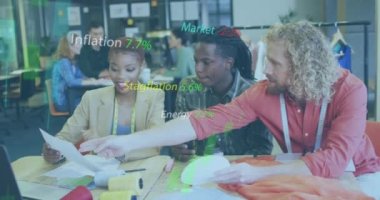 Animation of data processing over diverse business people working at office. Global business and digital interface concept digitally generated video.