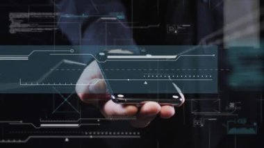 Animation of computing data processing over man using smarpthone. Global science, business, finance, computing and data processing concept digitally generated video.