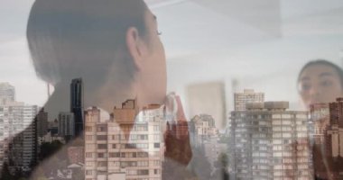 Animation of cityscape over biracial woman applying beauty face mask. Lifestyle, fashion and light concept digitally generated video.