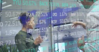 Animation of data processing over diverse business people working at office. Global business and digital interface concept digitally generated video.