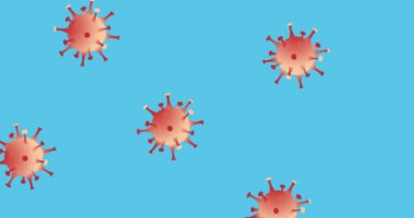 Animation of covid 19 cells over blue background. Global covid 19 pandemic, healthcare services and data processing concept digitally generated video.