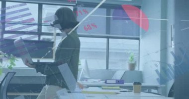 Animation of data processing over biracial businesswoman working in office. Global business and digital interface concept digitally generated video.