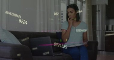 Animation of numbers and data processing over woman using laptop. Global computing, connections, communication and data processing concept digitally generated video.