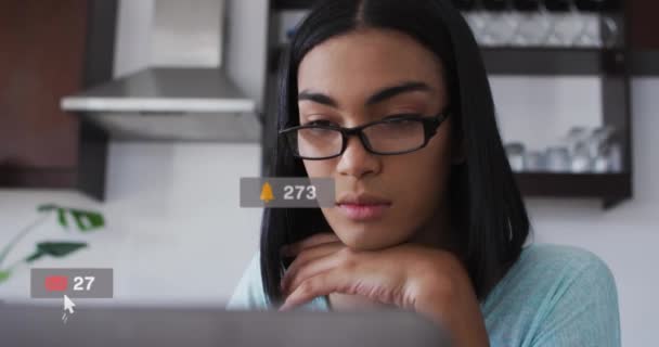 Animation Social Media Icons Numbers Biracial Woman Using Laptop Global — Stockvideo
