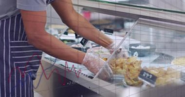 Animation of numbers and data processing over biracial man with plate of food in shop. Global shopping, business, finance, computing and data processing concept digitally generated video.