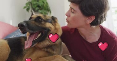 Animation of red heart icons over caucasian woman with pet dog. National love your pet day concept digitally generated video.