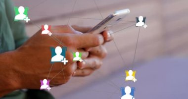 Animation of network of profile icons against mid section of a man using smartphone outdoors. Global networking and business technology concept