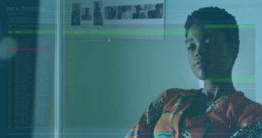 Animation of interface with data processing against thoughtful african american woman at office. Computer interface and business technology concept