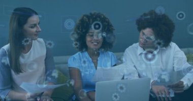 Animation of financial data processing over diverse business people. Global business, finances, computing and data processing concept digitally generated video.