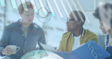 Animation of financial data processing over diverse business people. Global business, finances, computing and data processing concept digitally generated video.