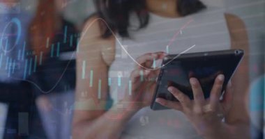 Animation of financial data processing over biracial businesswoman using tablet. Global business, finances, computing and data processing concept digitally generated video.