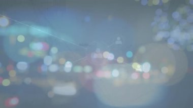 Animation of network of connections over icons and cityscape. Global business and digital interface concept digitally generated video.