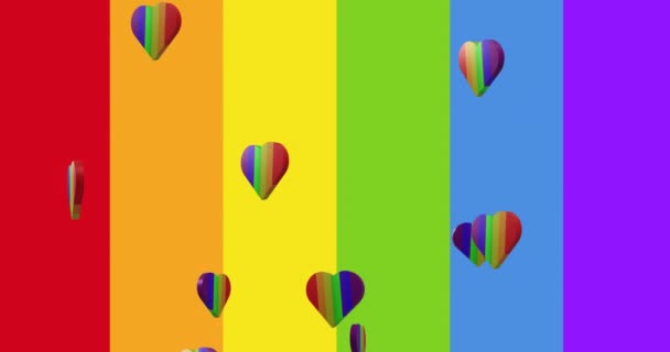 彩虹心旋转和彩虹条纹的动画 Lgbt和平等概念数字生成的视频 — 图库视频影像