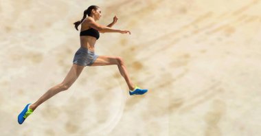 Composition of female female long jumper with copy space on yellow background. sport and competition concept digitally generated image.