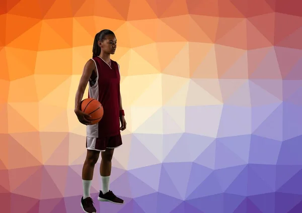 Composition of female basketball player with ball and copy space on patterned background. sport and competition concept digitally generated image.