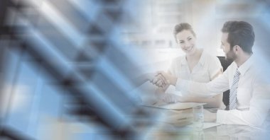 Composition of happy diverse business team shaking hands with motion blur. global business, partnership and success concept digitally generated image.