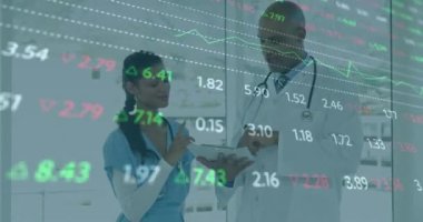 Animation of financial data processing over diverse doctors at hospital. Global medicine, healthcare, finances and digital interface concept digitally generated video.