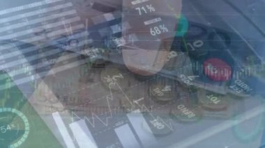 Animation of financial data processing over hands holding payment terminal. Global business, finances and digital interface concept digitally generated video.