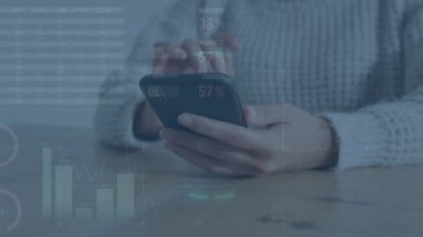 Animation of statistical data processing over mid section of woman using smartphone at office. Global networking and business data technology concept