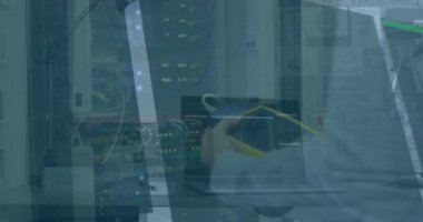 Animation of financial data processing over laptop in server room. Global technology, finances and digital interface concept digitally generated video.