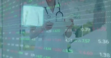 Animation of financial data processing over caucasian female doctor at hospital. Global medicine, healthcare, finances and digital interface concept digitally generated video.
