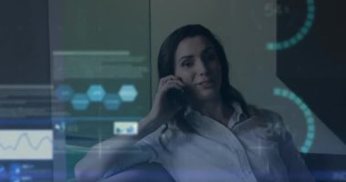 Animation of financial data processing over caucasian businesswoman using smartphone. Global business, connections and digital interface concept digitally generated video.