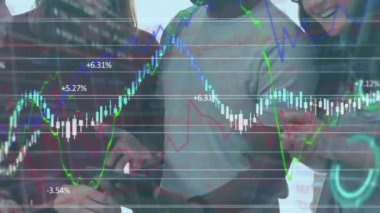 Animation of financial data processing over diverse people using tablet. Global business, finances and digital interface concept digitally generated video.