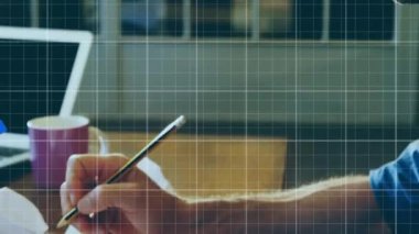 Animation of financial data processing over caucasian man taking notes. Global business, finances and digital interface concept digitally generated video.