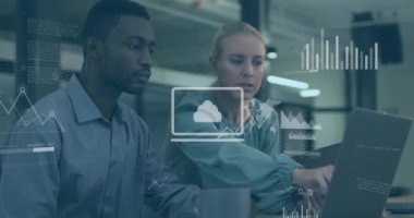 Animation of data processing over diverse man and woman discussing over laptop at office. Computer interface and business technology concept