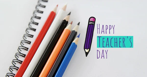 Image of happy teachers day text over pencils and notebook. school, education and study concept digitally generated image.