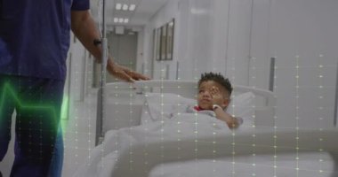 Afro-Amerikan erkek doktor ve hasta çocuk üzerinde yeşil yaşam belirtilerinin canlandırılması. Dijital olarak üretilen tıbbi ve sağlık hizmetleri kavramı.