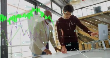 Animation of financial data processing over diverse business people working in office. Global business, finances, computing and data processing concept digitally generated video.